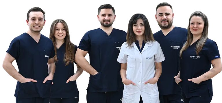 Zes medewerkers van Hairtec Haarkliniek in werkkleding